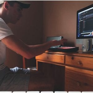 Kyle Sweezy working on Music Production