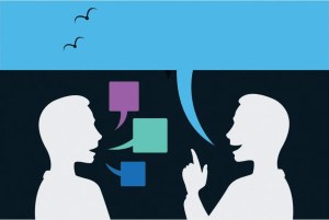 Two people talking with speech bubbles.